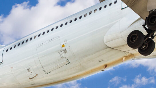 View of an airplane flying in the sky.