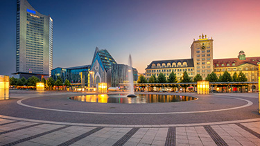 Leipzig city fountain and buildings