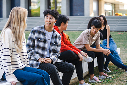 group of students on campus talking