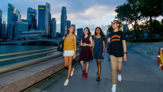 Curtin Singapore students walking on the road