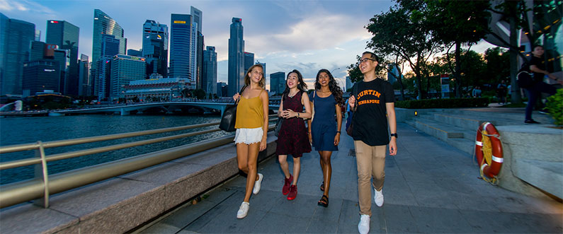 Curtin Singapore students walking on the road