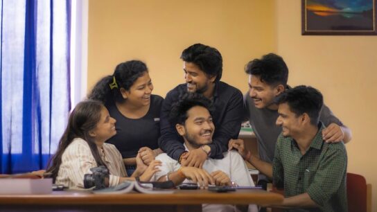 Group of students in a class room.